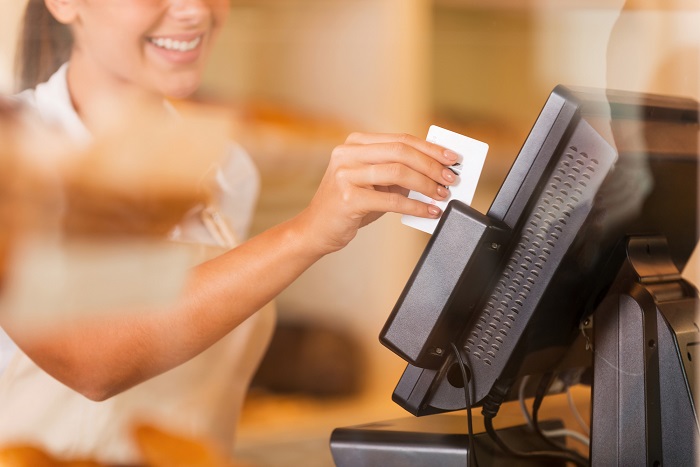 cashier swiping card