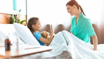 nurse smiling at patient