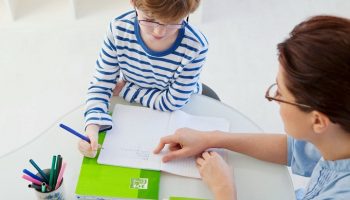 speech language therapist with child