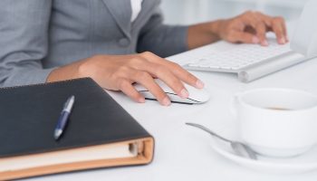 Administrative coordinator at business table